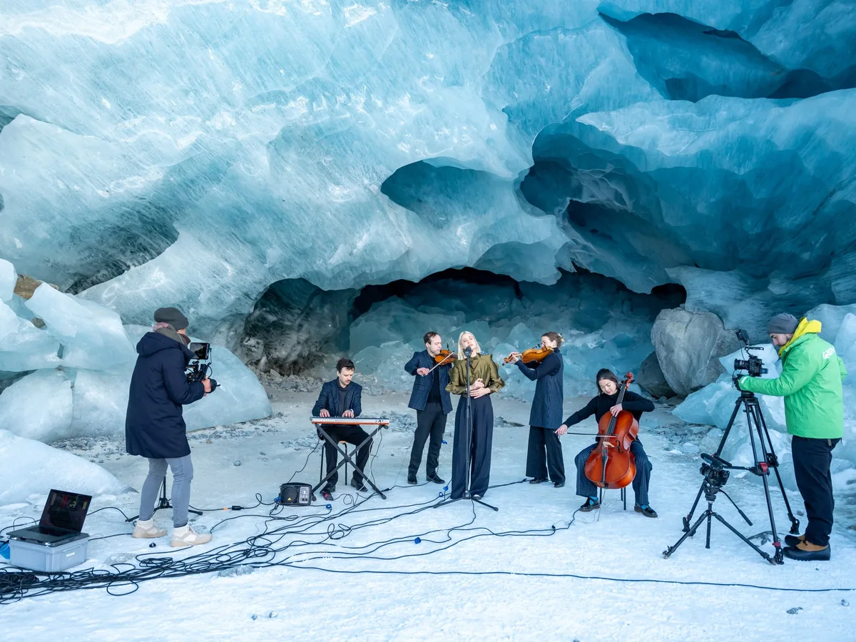 Musician performs inside melting glacier to highlight climate crisis