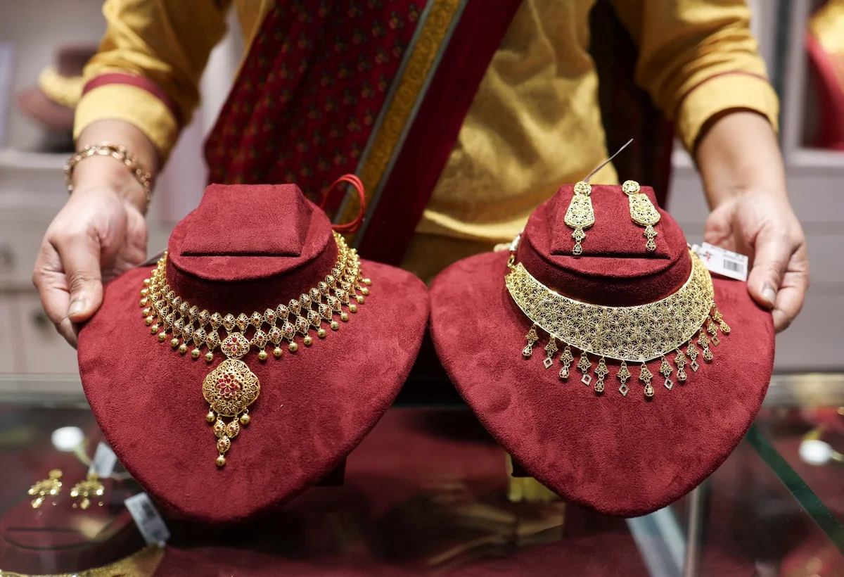 Gold drops as inflation worries linger on failed US-Iran talks - Reuters