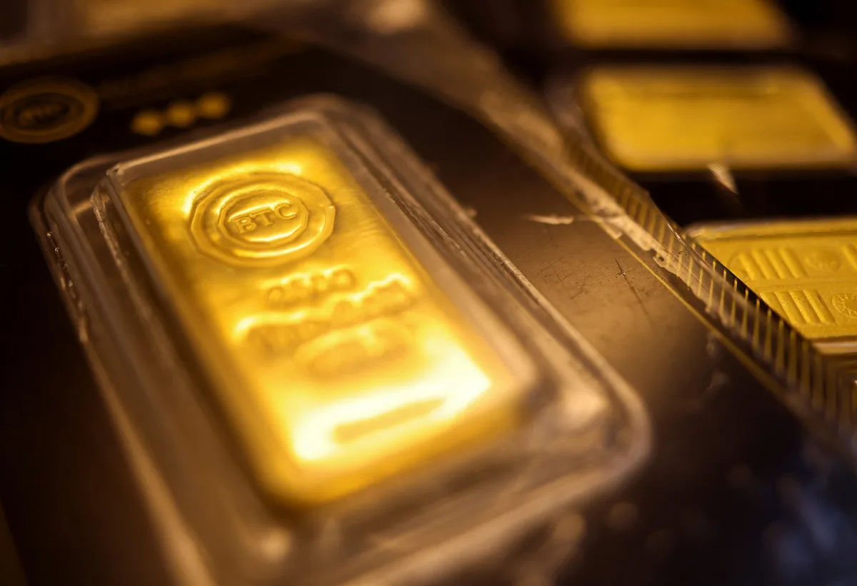 Gold hits three-week low with US-Iran talks, central bank decisions in focus - Reuters